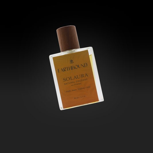 Solaura Eau de Parfum bottle natural cologne by Earthbound Scents on black background